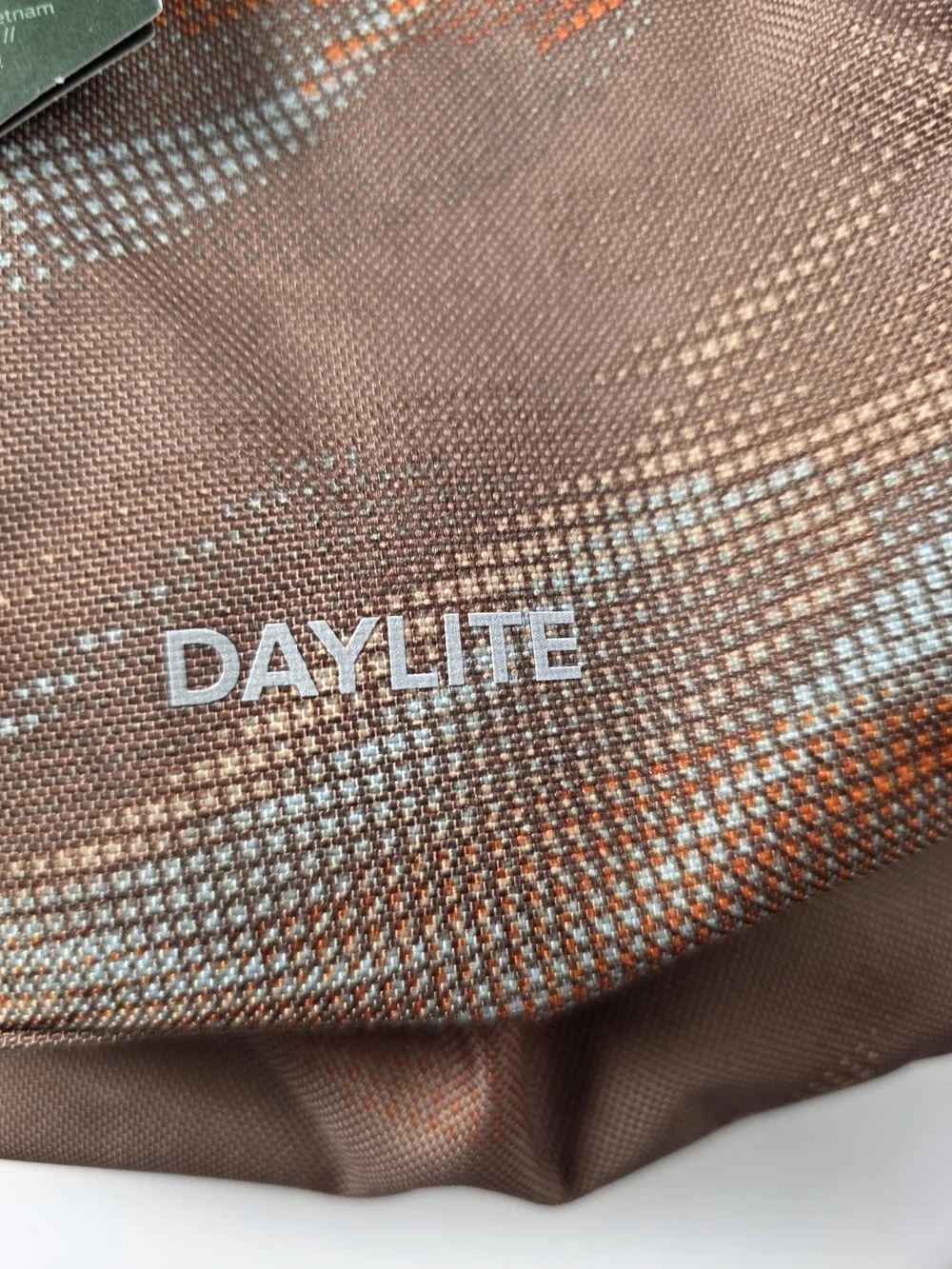 OSPREY Smoky Desert Print Daylite Backpack in Brown with Orange and Blue Accents